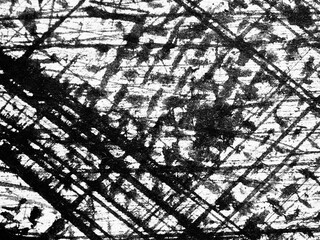 Abstract black and white texture with intersecting lines creating a striking visual composition