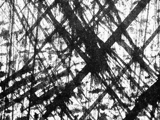 Abstract black and white texture showcasing intersecting lines and patterns on a textured surface