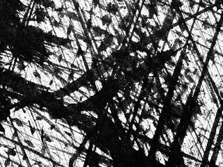 Abstract black and white art featuring chaotic lines and textures conveying movement and energy in contemporary design