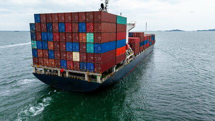 shipping cargo logistic, container ship carrying in sea import export goods and distributing...