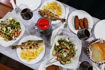 Albanian cuisine - fish, wine and eggplants