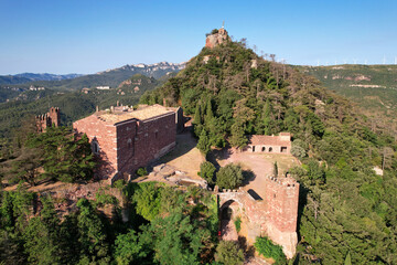 Monestir d'Escornalbou castle on sunny summer day. Riudecanyes, Tarragona, Spain.