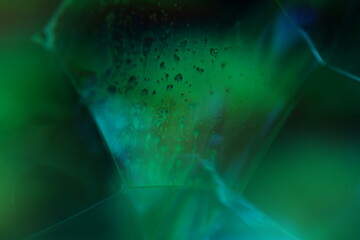 Green liquid surface, phenomenal structure, green oils on a dark background, colourful abstract,...