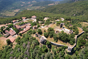 Drone view of l'Albiol castle and the village on sunny summer day. Tarragona, Spain.
