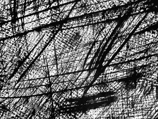 Abstract black and white art displaying chaotic lines and textures created through dynamic brush...