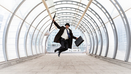 The City Gent, Jumping for Joy. A traditional London financial business man celebrating his bonus....