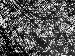 Abstract black and white texture showcasing intricate lines and patterns from a dynamic surface...