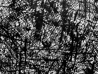 Abstract black and white texture showcasing intricate patterns created by scratching and layering...
