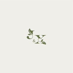 organic leaf logo bold initial concept letter luxury wedding monogram design JX