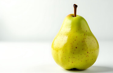 vibrant green pear crisp white backdrop speckled skin radiating warm natural light soft overhead