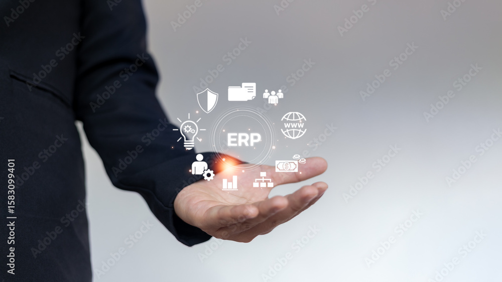 Poster a businessman is holding an erp interface surrounded by digital icons representing enterprise resour