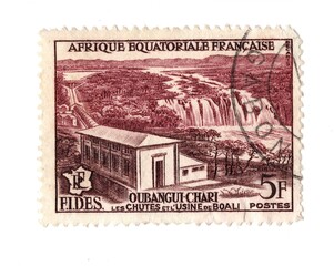 A vintage postage stamp from French West Africa isolated on a white background.