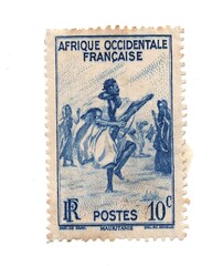 A vintage postage stamp from French West Africa isolated on a white background.