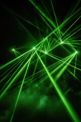 Green laser beams cutting through thick fog in the dark nightclub air