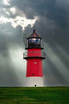 The lighthouse of B&uuml;sum in Germany in stormy weather.