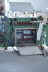 Industrial Control Panel with Wiring, Relays, and Rusted Components – Open Machine Interface