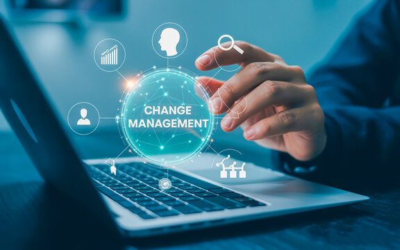 Hand interacts with holographic change management interface