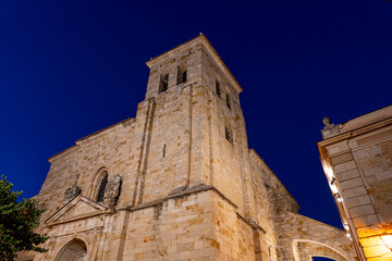Historic stone architecture illuminated at night in Zamora, Castilla y Leon, Spain showcasing rich...