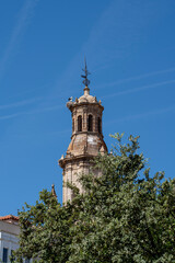 Historic tower view in Toro, Zamora on a clear sunny day featuring a stork nest