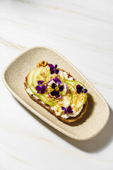 bruschetta with cottage cheese, pear, walnut and honey