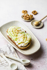 bruschetta with cottage cheese, pear, walnut and honey