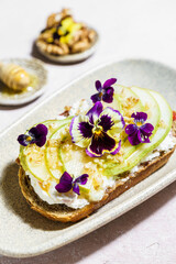 bruschetta with cottage cheese, pear, walnut and honey