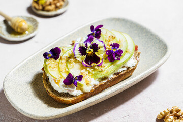 bruschetta with cottage cheese, pear, walnut and honey