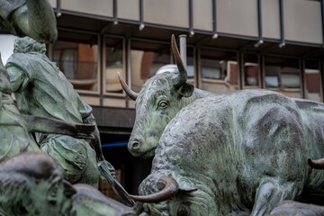 San Fermin sculpture in Pamplona, Navarra, depicts the traditional bull run celebration