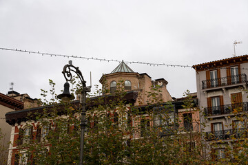 Beautiful architecture of Pamplona showcasing a historical building under a cloudy sky in Navarra,...