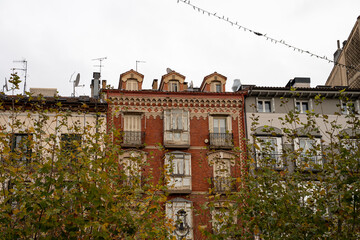 Elegant historic architecture showcased in Pamplona, Navarra among lush greenery and urban landscape