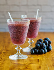 red grape smoothie blended with ice and topped with club soda