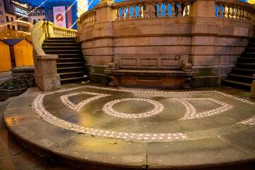 Beautiful evening at Plaza del Castillo in Pamplona, Navarra, Spain with decorative lights and...