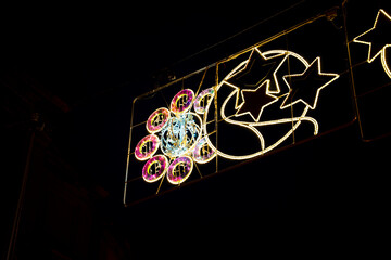 Colorful illuminations in Pamplona, Navarra create a festive atmosphere during the evening...