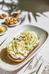 bruschetta with cottage cheese, pear, walnut and honey