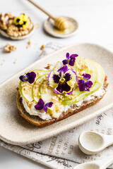 bruschetta with cottage cheese, pear, walnut and honey