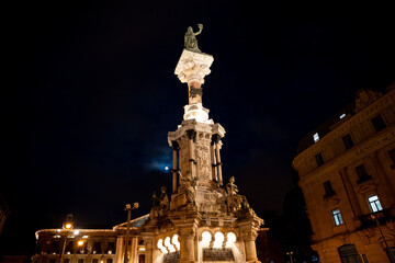 Monumento a los Fueros in Pamplona, Navarra, Spain illuminated at night