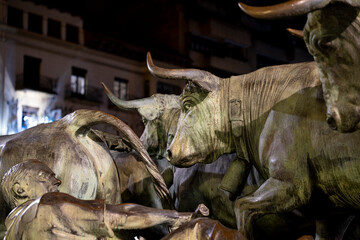 Historic San Fermin sculpture depicting the famous running of the bulls in Pamplona, Navarra, Spain...