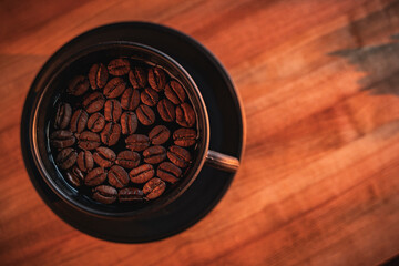 coffee beans on wooden background