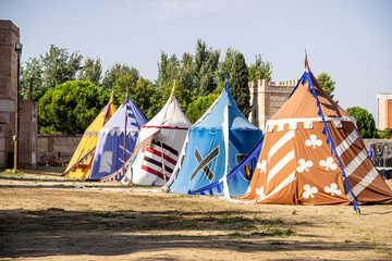 Medieval fair in Madrid Spain showcases colorful tents and vibrant atmosphere during the lively...