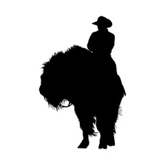 Cowboy Silhouette Riding Bison in Profile © umut hasanoglu