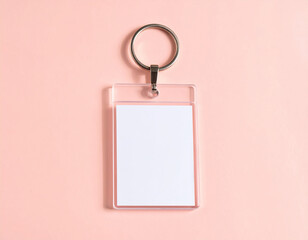 A minimalist acrylic charm pendant on clean pastel background with empty space for text, popular keychain decoration style