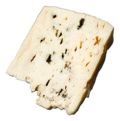 Closeup of a creamy blue cheese wedge with mold veins, textured rind, aged appearance, and dark mold streaks on a black background