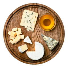 Assorted gourmet cheese platter featuring parmesan cubes blue mold cheese camembert and honey on rustic wooden serving board