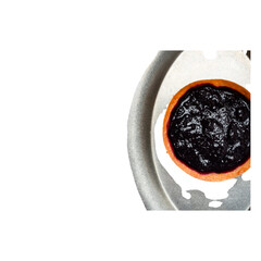 Mini berry tart with rustic shortcrust pastry shell and vibrant dark purple berry filling, isolated on transparent background, closeup of delicious fruit dessert