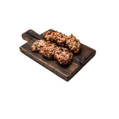 Homemade oat cookies with nuts and dried fruits on rustic wooden serving board isolated on transparent background