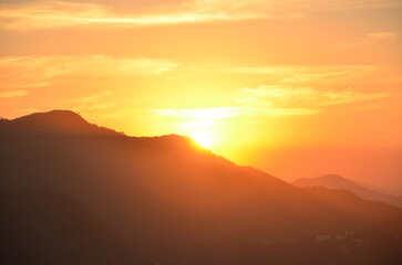 Fototapeta premium sunset over the mountains
