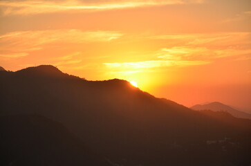 Fototapeta premium sunset over the mountains