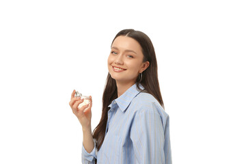 Young woman savors perfume in bright light, isolated on white, PNG