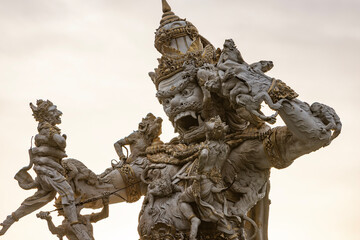 Statue of God fighting with monkeys in Pura Luhur Uluwatu, Bali, Indonesia