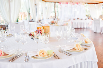 Elegant Table Setup for Wedding Reception with White Decorations
